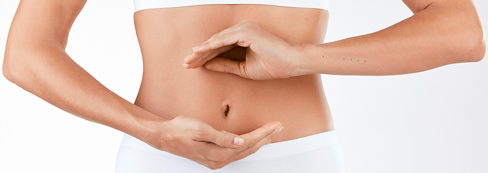 Woman hands on the belly
