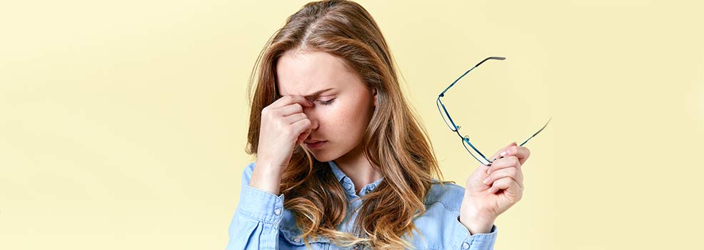 Girl experiencing eye strain