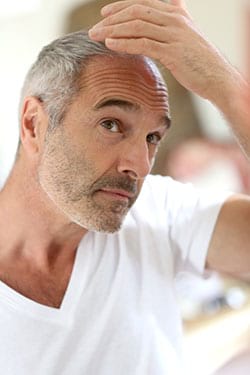 Man checking his hair