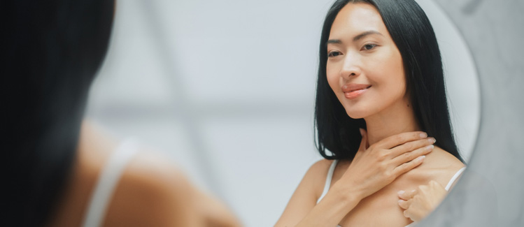 woman applying lanolin cream