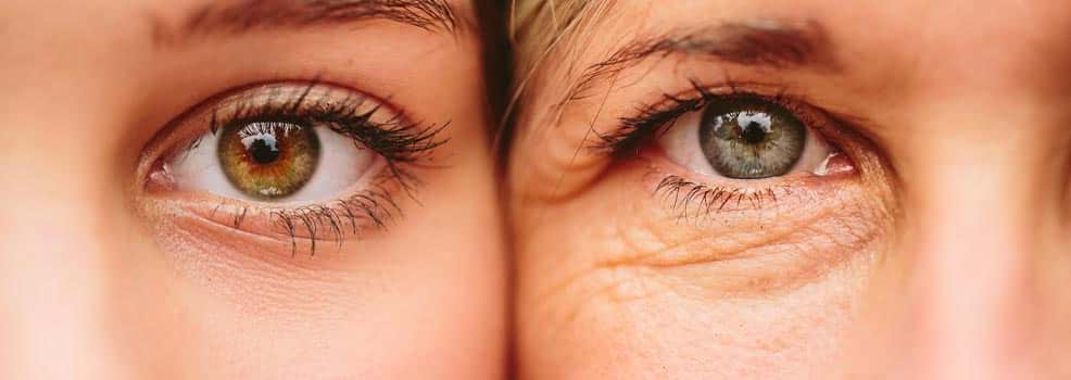 Close up photo of a young and old woman.