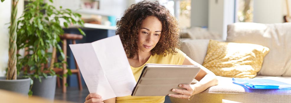Woman reading research papers