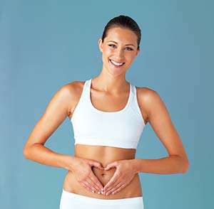 Woman promoting digestive health