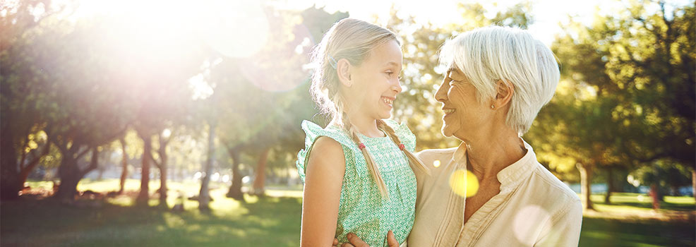 Grandmother with granddaughter.