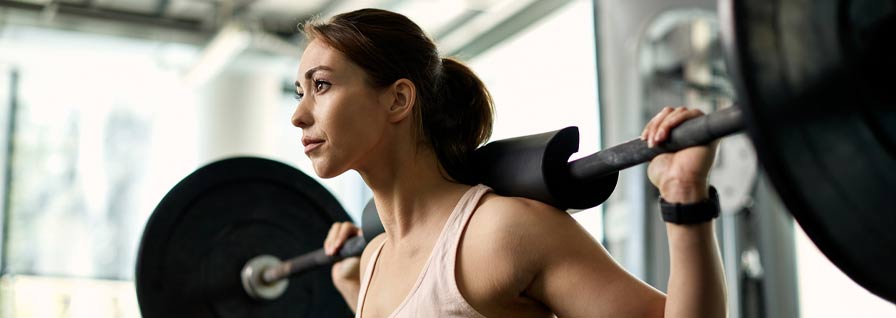 Woman lifting barbell